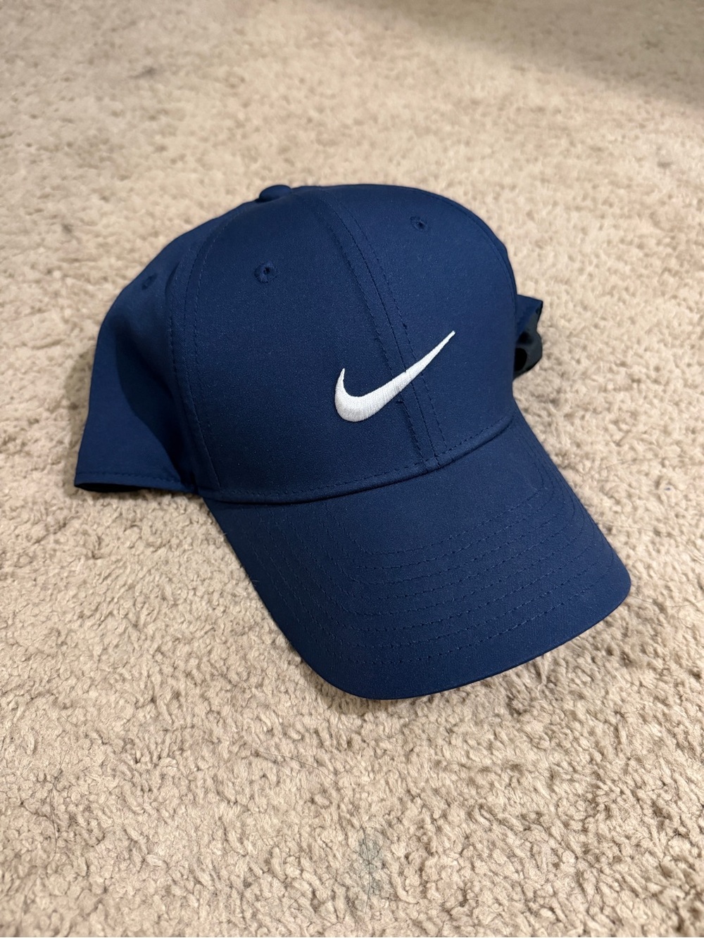 Nike Men’s Navy Blue Hat with White Swoosh